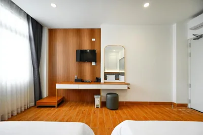 Chambre triple Deluxe — Lotus Airport Hotel Saigon